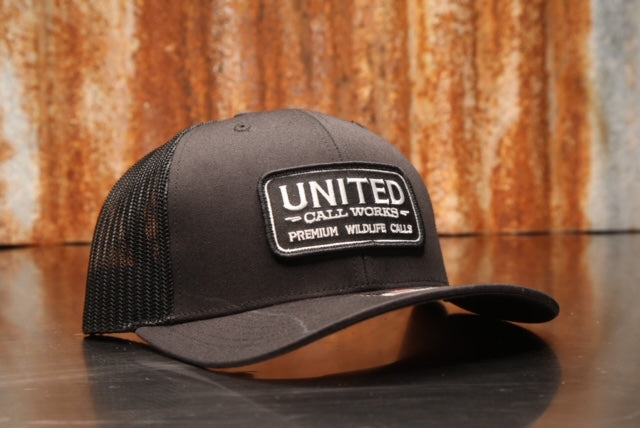 Black Richardson 112 Trucker Hat with Black and White Stitched Patch